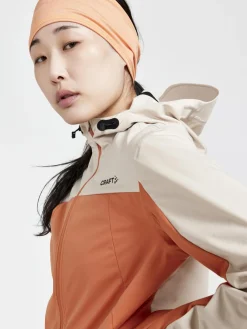 Women Craft Sportswear Women's ADV Essence Hydro Jacket - Rusty Glow/Ecru