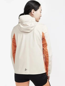 Women Craft Sportswear Women's ADV Essence Hydro Jacket - Rusty Glow/Ecru